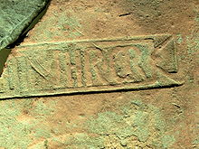 Ancient Roman stamp on a hypocaust brick, used by the third cohort of Roman citizens from Thrace